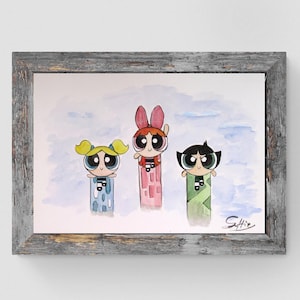 May include: Watercolor painting of the Powerpuff Girls in a rustic gray frame. The artwork features the three cartoon characters in their signature colors: blue, pink, and green. The painting hangs above a gray dresser with silver drawer pulls.