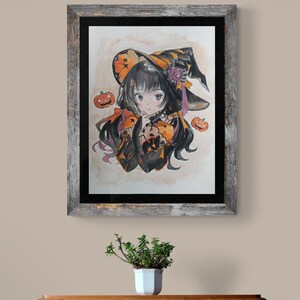 May include: Watercolor painting of a young witch in a black and orange outfit and hat, holding a pumpkin. The artwork is framed in a rustic wooden frame and features two jack-o'-lanterns. The artwork is displayed on a wall.