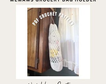 May include: A white, crocheted grocery bag holder, hanging from a hook. The bag is filled with colorful items. Text on the image reads "MEMAWS GROCERY BAG HOLDER" and "PDF CROCHET PATTERN". The bottom of the image has the text "Nerdy Hippie Creations".