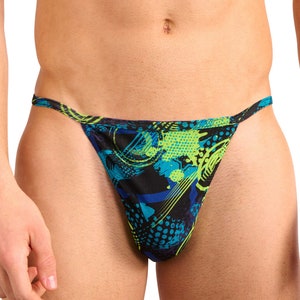Puede incluir: Ropa interior negra y verde con un diseño geométrico.