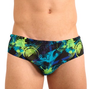 May include: Black swim trunks with a green, blue, and white abstract print.