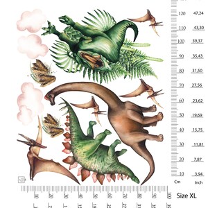 May include: Watercolor illustration of various dinosaurs, including a green Spinosaurus, a brown Brachiosaurus, and a green Stegosaurus, with pterodactyls and clouds. The image has a ruler with measurements in inches and centimeters. Size XL.