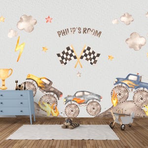 May include: A watercolour illustration for a child's room featuring monster trucks, checkered flags, and the text "Philip's Room." The room includes a blue chest of drawers, a trophy, and a toy aeroplane.