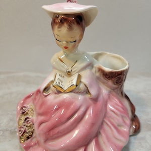 Josef&#39;s Originals &quot;Melissa&quot; beautiful ceramic girl in pink reading a book, rose and gold accents