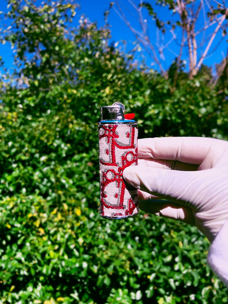 Designer Lighter Cases use coupon code 3FOR35 TO Etsy