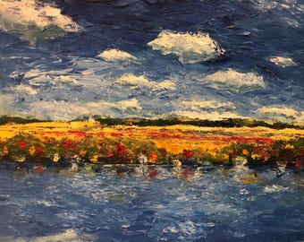 May include: A painting of a landscape with a blue sky, white clouds, a field of yellow and red flowers, and a blue lake reflecting the sky.