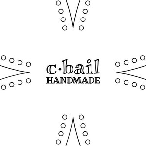 May include: Black and white logo with the text "c.bail HANDMADE" in a stylized font.