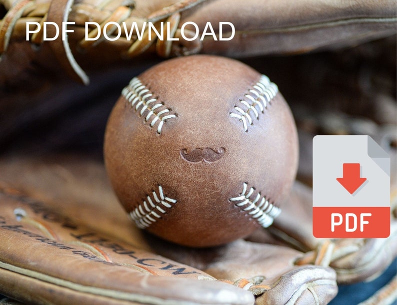 May include: A brown leather baseball with white stitching and a mustache design. The baseball is resting in a brown leather baseball glove. A PDF download icon is in the corner of the image.