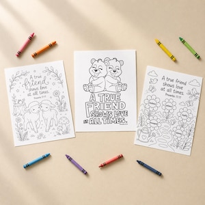 May include: Three coloring pages with black line drawings and the text "A true friend shows love at all times." and "Proverbs 17:17." The pages feature images of lambs, bears, and flowers. Crayons in various colors surround the pages.