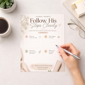 May include: A journal page with the title "Follow His Steps Closely" and prompts for self-reflection. The page includes questions like "When do I react too fast?" and "What triggers me most?" A hand holds a pen, ready to write.