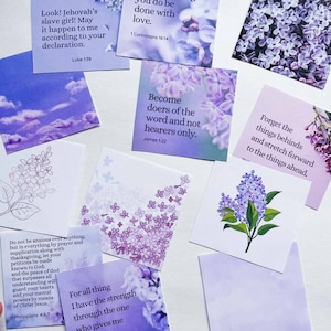 May include: A collection of inspirational quotes on purple and white cards with a floral theme. The quotes are from the Bible and include verses like "Let everything you do be done with love." and "Become doers of the word and not hearers only."