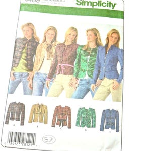 May include: Simplicity sewing pattern 4489 featuring five jacket designs. The pattern includes images of the finished jackets in various colors and styles, with a size range of H5 (6,8,10,12,14). The pattern is printed on white paper.