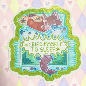 cries myself to sleep crying cat meme rainbow holographic glitter vinyl sticker! (3")