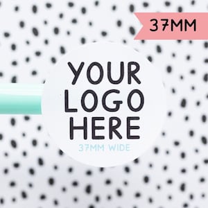 May include: White round sticker with black text that says "YOUR LOGO HERE" and "37MM WIDE" in smaller text. The sticker is 37mm wide.