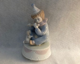 Musikalische Porzellan Clown Figurine spielt Flöte für Welpen. Paul Sebastian. Dreht und spielt Melodie ""Gefühle""."