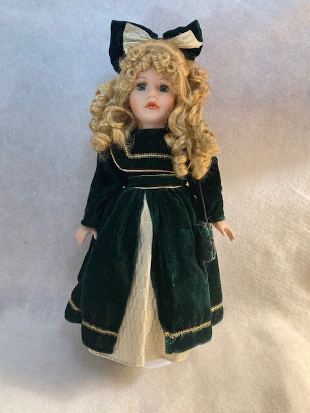 Vintage Porcelain Doll Blue Green Eyes in Gold & Green