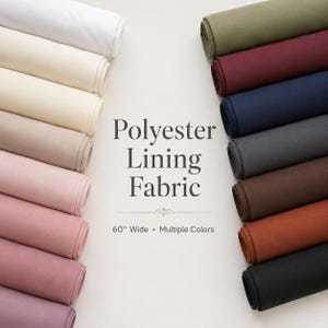 May include: Multiple rolls of polyester lining fabric arranged in two columns. The text reads Polyester Lining Fabric, 60" Wide, Multiple Colors. The fabric colors include white, cream, beige, pink, olive green, burgundy, navy, gray, brown, orange, and black.