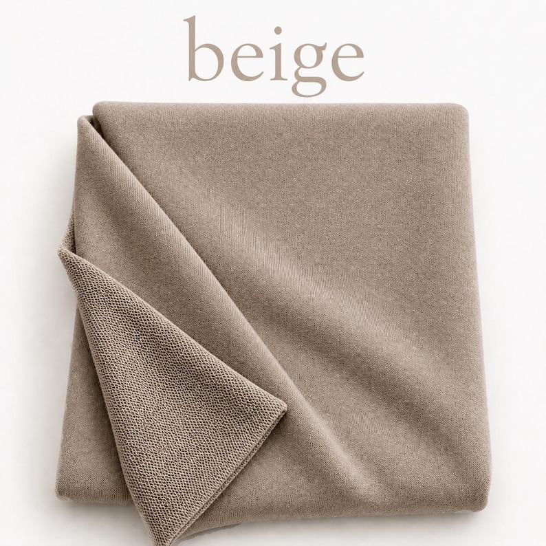 May include: A folded piece of beige fabric with a smooth, solid-colored top surface and a textured, knit-like underside. The word beige is printed in a light brown, sans-serif font above the textile, which is neatly arranged in a square.