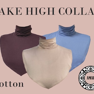 May include: Three cotton turtleneck collars in different colors: burgundy, beige, and light blue. The collars are all fake high collars, meaning they are not attached to a shirt. The collars are all made of cotton and are soft and comfortable to wear. The collars are all in focus and the background is a light pink color. The text "FAKE HIGH COLLAR" is at the top of the image and the text "Cotton" is at the bottom of the image.