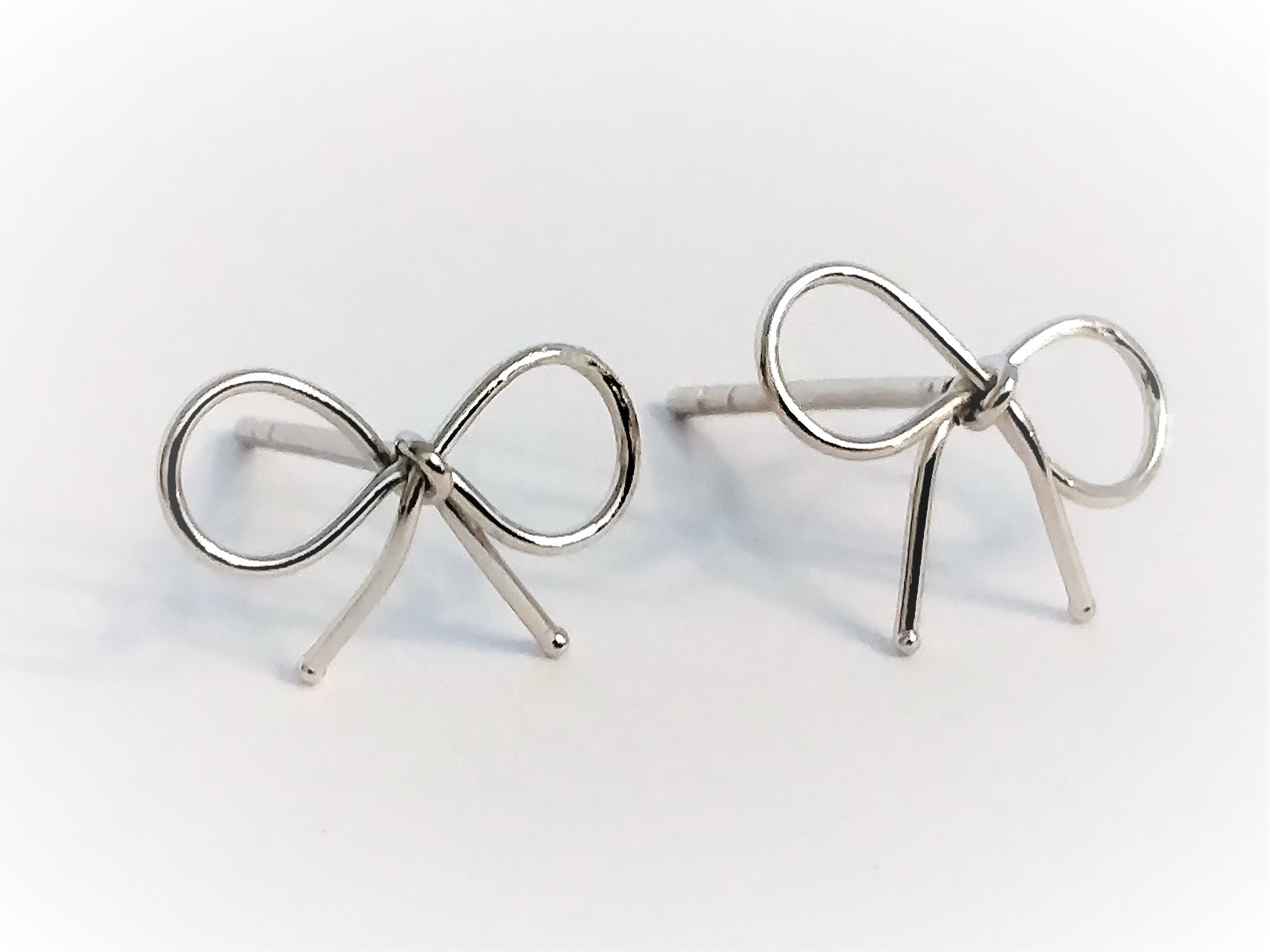 silver bow earrings