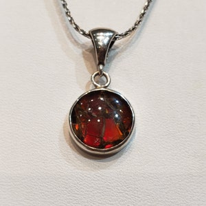 Ammolite Red Round Pendant Set in Sterling Silver. PN. E00424G