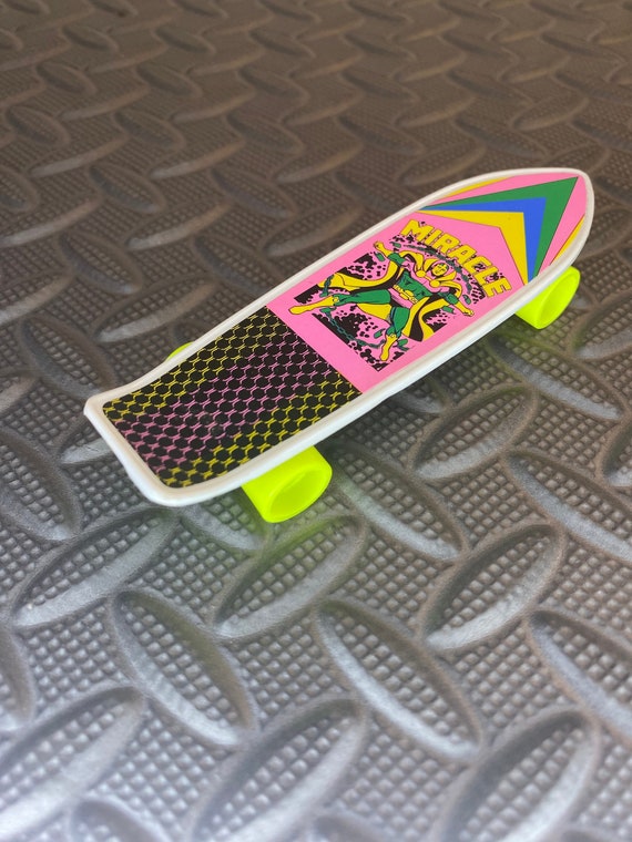 Mister Miracle vintage Skateboard Pencil Sharpener Fluorescent Yellow Wheels Wella Made in China