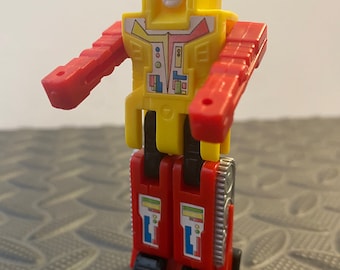 Bulldozer Zybotz Earthbreaker variante de carrocería amarilla 1984 REMCO