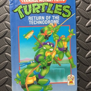 Las Tortugas Ninja Adolescentes Mutantes Regresan del Technodrome libro de cuentos vintage Cataratas del Niágara TMNT TMHT 1990 Carnival Mirage Studios