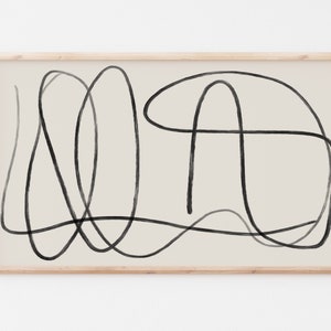 May include: Abstract line art print in black and white on a beige background. The lines are simple and organic, creating a modern and minimalist design.