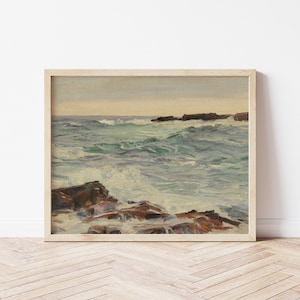 May include: A framed painting depicting a seascape with crashing waves and rocky outcroppings. The painting is done in a realistic style with muted colors.