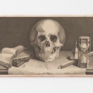 May include: A black and white engraving of a still life featuring a human skull, an hourglass, a book, and a quill pen. The skull is the focal point of the image and is positioned in the center.