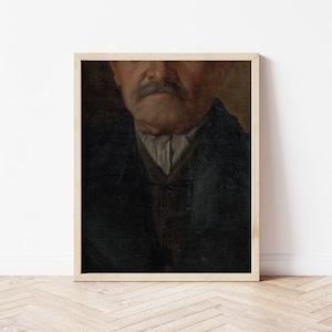 May include: A close-up of an oil painting depicting a man's face. The man has a mustache and is wearing a dark jacket and a white collared shirt.