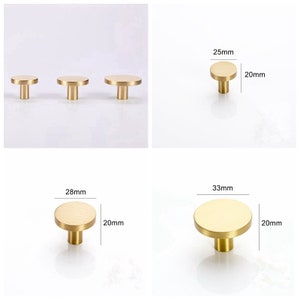 May include: Four gold-toned round cabinet knobs with a flat top and a short stem. The knobs measure 20 mm in diameter and 25 mm, 28 mm, and 33 mm in height.
