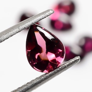 Pear Rhodolite Garnet: Pink Gemstone, Buff Top Cut (8X6X4 mm)