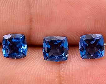 Natural London Blue Topaz: 7x7mm Cushion Cut Gemstone