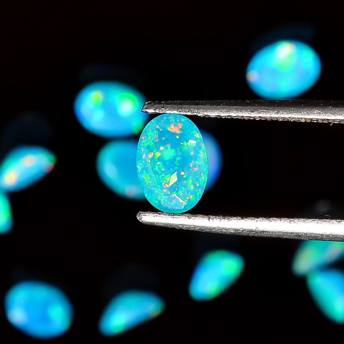 PARAIBA OPAL 8 x 6 MM OVAL CUT NEON BLUE COLOR SOLD PER STONE