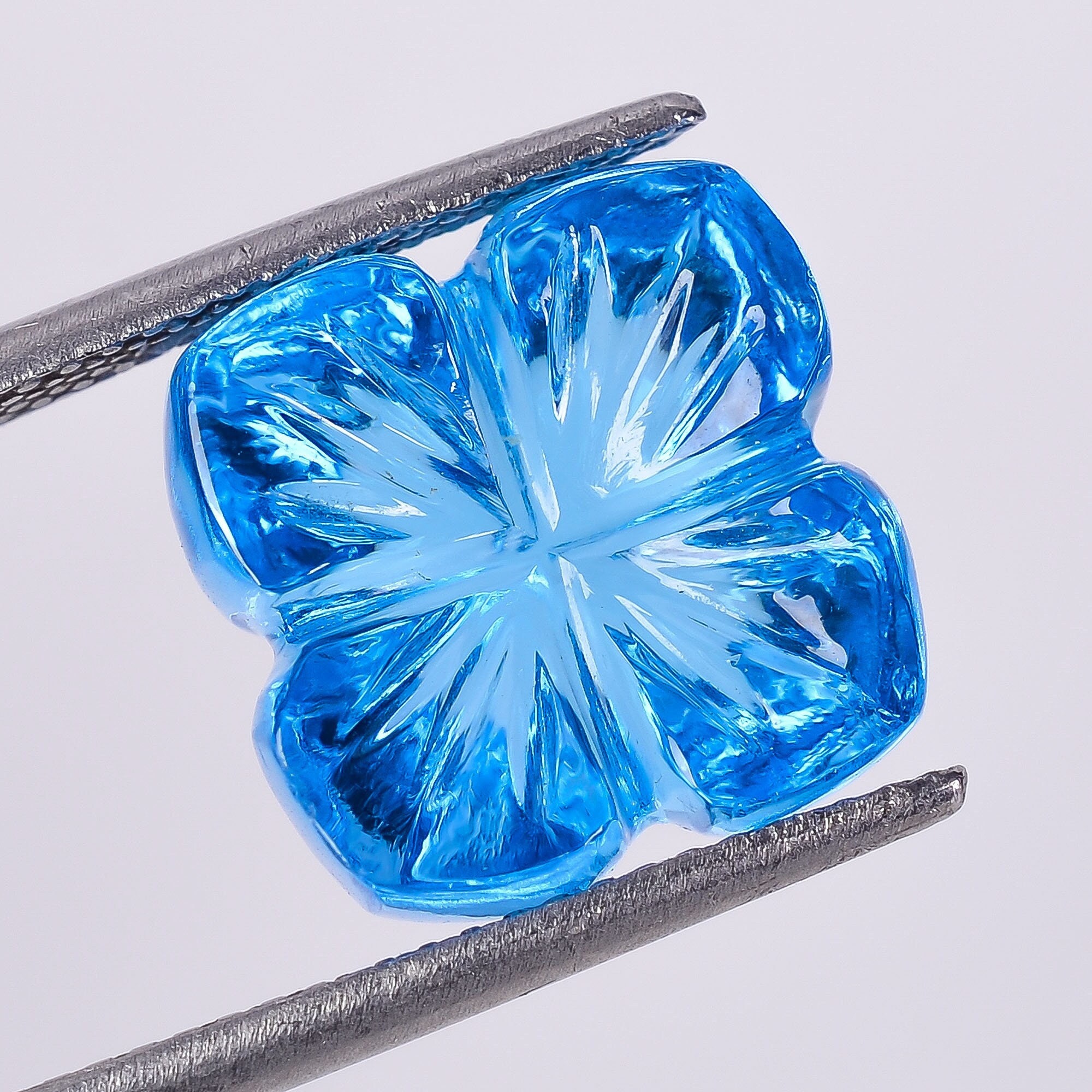 Handmade Swiss Blue Topaz Carving: Flower Cut Cushion Stone