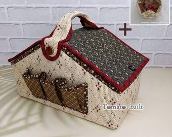 May include: A quilted fabric storage caddy with a handle, featuring a cream base with a red and black diamond pattern, a dark green top with a small floral print, and three brown plaid exterior pockets. The text TomatoQuilt Designed by TomatoCandy is visible.