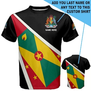 Może przedstawiać: Czarny T-shirt z diagonalnym wzorem przedstawiającym flagę Grenady. Flaga jest żółta, zielona i czerwona z gwiazdą w środku. Na koszulce nadrukowany jest tekst "NAME HERE".