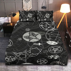 May include: Black and white quilted bedding featuring a repeating pattern of pentagrams, stars, and other occult symbols. The bedding is made of soft, comfortable fabric and is perfect for adding a touch of gothic style to any bedroom.