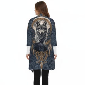 May include: A dark blue kimono-style cardigan featuring a detailed wolf illustration. The wolf is depicted on a rock within a dreamcatcher design, with gold and feather accents. The cardigan has long sleeves and a flowing silhouette.