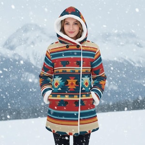 May include: A patterned hooded coat in red, blue, yellow, and beige with a geometric design. The coat features a double-breasted closure with black buttons and white faux fur trim. The background shows a snowy mountain scene.