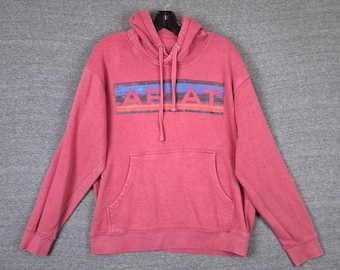 Sudadera con capucha Ariat para hombre, talla M, color rojo. Sudadera con capucha con logo y estampado de canguro. Estilo western grunge.