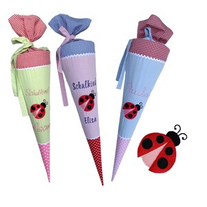 Cône scolaire "Coccinelle" 70 cm ou 80 cm brodé du prénom - nombreux tissus au choix