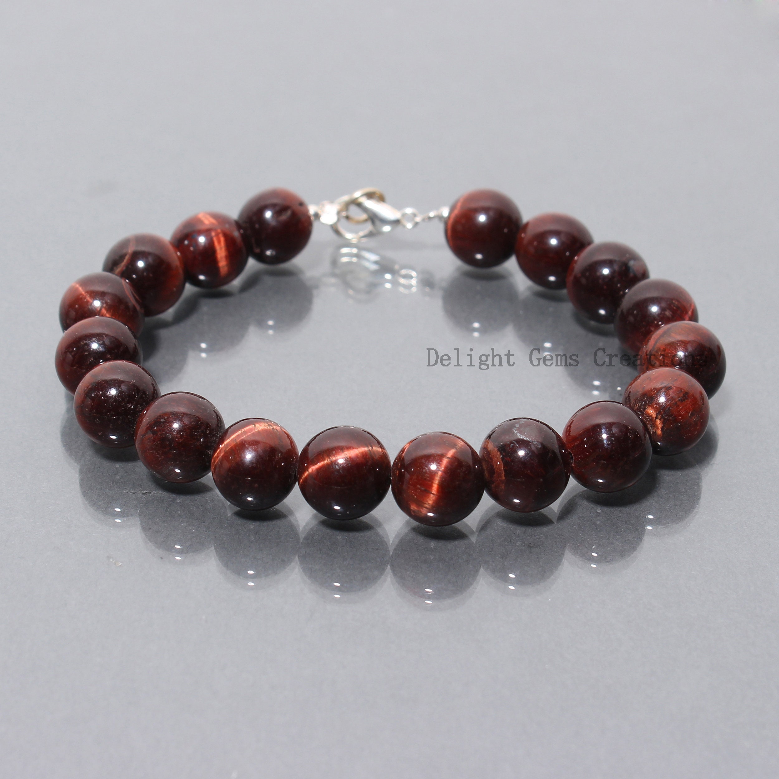 Red Tiger Eye Bracelet at Rs 85 / Pieces in Anand | Swara Crystal