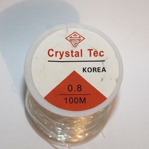 EW-003-CL / 50m Spool Crystal Tec 0.3mm Clear Elastic Cord, Clear
