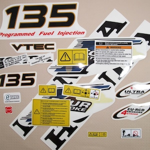 Vinyl graphic decals set handmade for Honda V TEC 135 four stroke outboard engine.Vinyl kit graphic stickers for Honda 135. Handmade