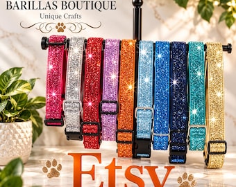 May include: A collection of ten glittery pet collars in various colors including pink, silver, red, purple, orange, light blue, blue, dark blue, teal, and gold, all hanging on a black metal display stand with adjustable buckles and clips.