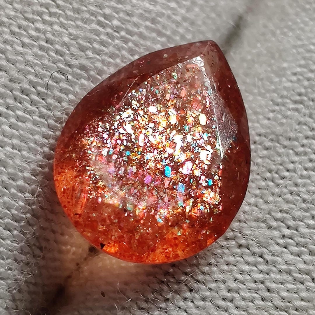 Fire Sunstone Pear Shape Multi Fire Sunstone Cut, 1.8 CTS 9x6.5x3mm, Dotted Fire ...
