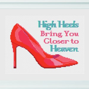 Pode incluir: Um sapato de salto alto vermelho com o texto "High Heels Bring You Closer to Heaven" em azul turquesa.